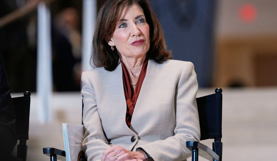 FILE - New York Governor Kathy Hochul participates in a ribbon cutting ceremony at the new JPMorgan Chase offices in New York, Oct. 21, 2025. (AP Photo/Seth Wenig, File)