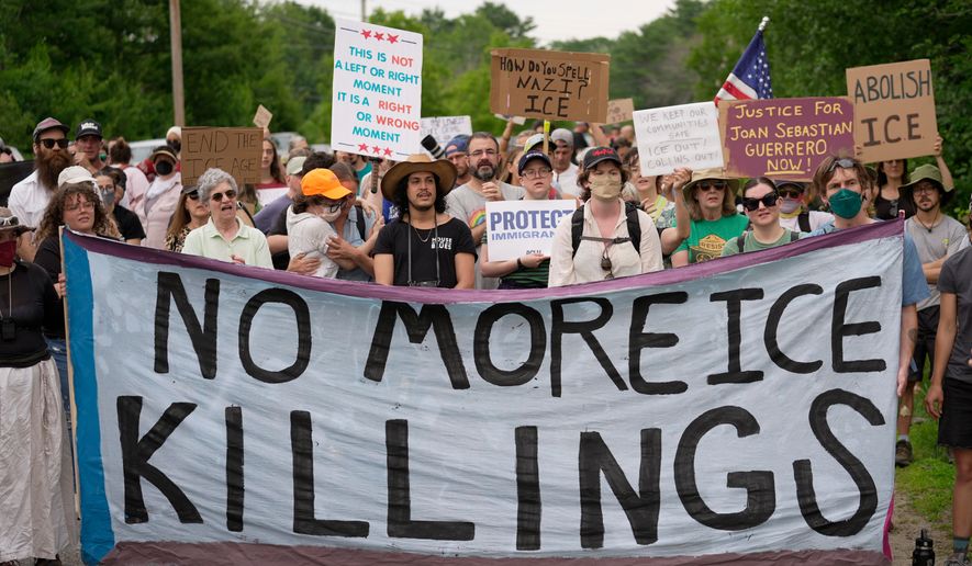 Protesters gather near a U.S. Immigration and Customs Enforcement facility Scarborough, Maine, one day after the shooting of Joan Sebastian Guerrero, Tuesday, July 14, 2026. (AP Photo/Robert F. Bukaty)