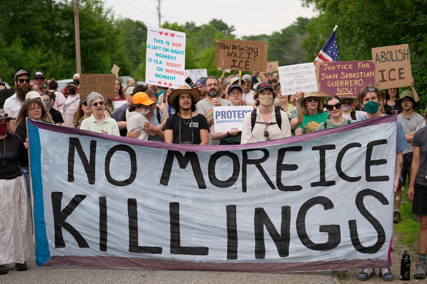 Protesters gather near a U.S. Immigration and Customs Enforcement facility Scarborough, Maine, one day after the shooting of Joan Sebastian Guerrero, Tuesday, July 14, 2026. (AP Photo/Robert F. Bukaty)