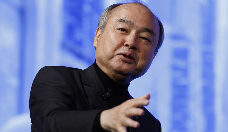Masayoshi Son, chairman and CEO of SoftBank Group, speaks during a business event in Tokyo, Tuesday, July 14, 2026. (Miyuki Saito/Kyodo News via AP)