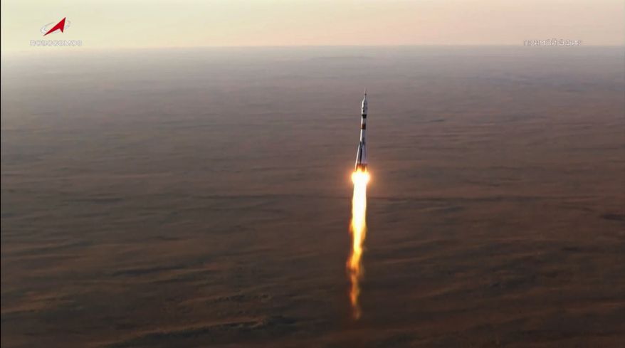 In this photo taken from video released by Roscosmos space corporation, the Soyuz-2.1 rocket booster with Soyuz MS-29 space ship carrying NASA astronaut Anil Menon, Roscosmos cosmonauts Pyotr Dubrov and Anna Kikina, a new crew to the International Space Station, ISS, blasts off in Russian leased Baikonur cosmodrome, Kazakhstan, Tuesday, July 14, 2026. (Roscosmos space corporation, via AP)
