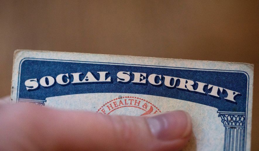 FILE - A Social Security card is displayed Oct. 12, 2021, in Tigard, Ore. (AP Photo/Jenny Kane, File)