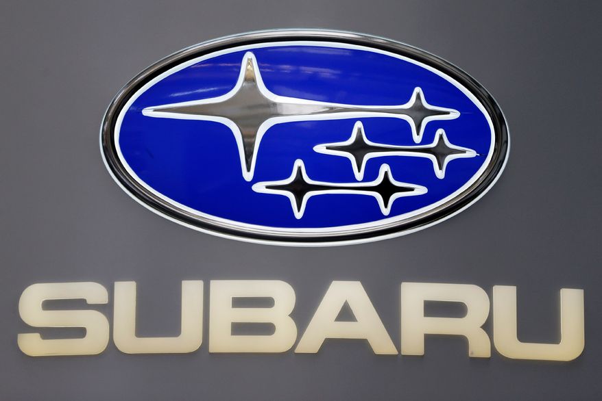 FILE - This Photo taken Feb. 14, 2013 shows a Subaru logo at the 2013 Pittsburgh Auto Show in Pittsburgh. (AP Photo/Gene J. Puskar, File)