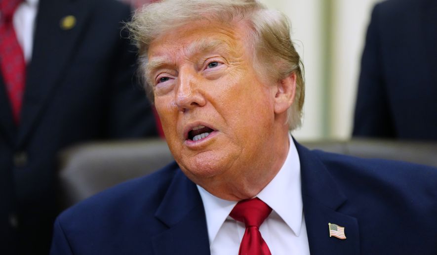 President Donald Trump speaks in the Oval Office of the White House, Monday, July 13, 2026, in Washington, as he signs executive orders. (AP Photo/Julia Demaree Nikhinson)