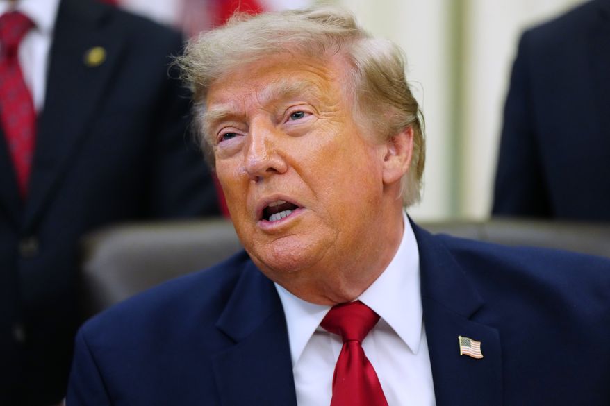 President Donald Trump speaks in the Oval Office of the White House, Monday, July 13, 2026, in Washington, as he signs executive orders. (AP Photo/Julia Demaree Nikhinson)