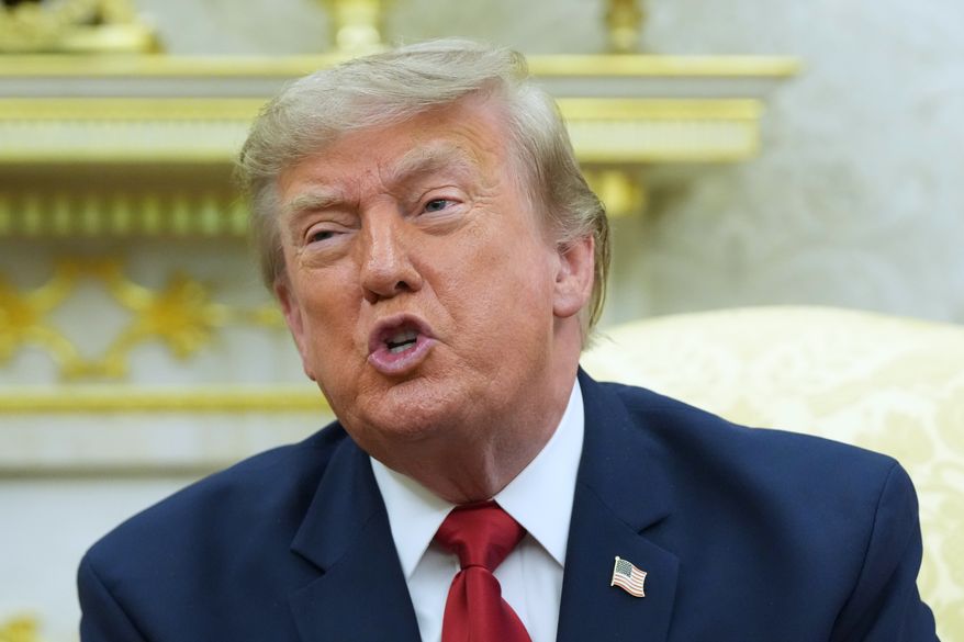 President Donald Trump speaks as he meets with Iraq's Prime Minister Ali al-Zaidi in the Oval Office of the White House, Tuesday, July 14, 2026, in Washington. (AP Photo/Julia Demaree Nikhinson)