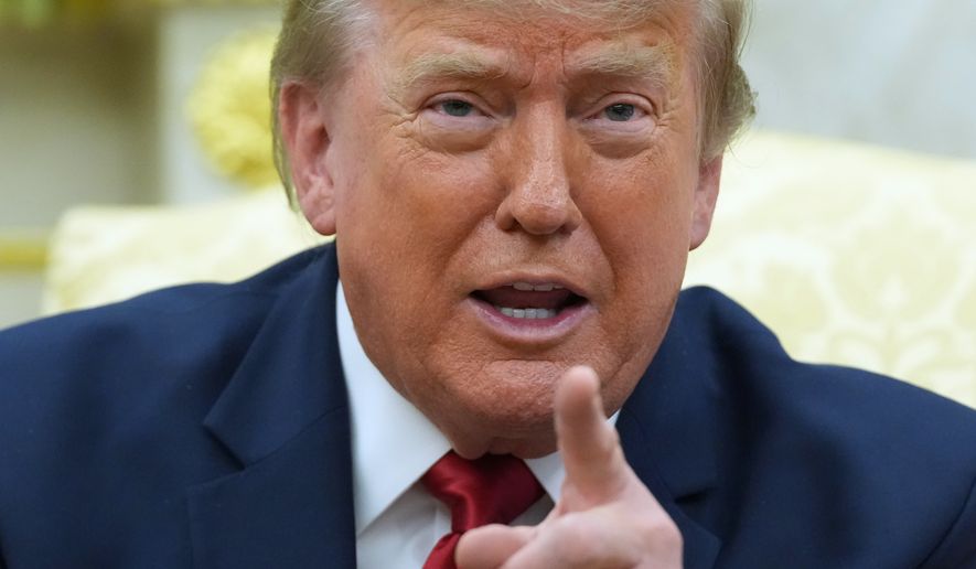 President Donald Trump speaks as he meets with Iraq's Prime Minister Ali al-Zaidi in the Oval Office of the White House, Tuesday, July 14, 2026, in Washington. (AP Photo/Julia Demaree Nikhinson)