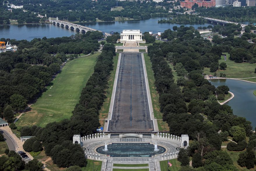 The Lincoln Memorial and the Reflecting Pool are seen from the Washington Monument, Wednesday, July 15, 2026, in Washington. (AP Photo/Rahmat Gul)