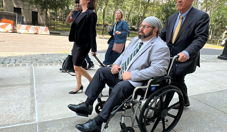 Former cargo ship captain John Merrone is wheeled out of federal court in the Brooklyn borough of New York by his lawyer, Bruce Barket, Wednesday, July 15, 2026, after pleading guilty to charges he drugged and sexually assaulted a U.S. Merchant Marine Academy cadet in 2019 while she was working on the vessel. (AP Photo/Michael R. Sisak)