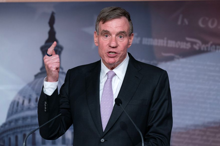 Sen. Mark Warner, D-Va., speaks during a news conference on Capitol Hill, Wednesday, June 17, 2026, in Washington. (AP Photo/Jose Luis Magana)