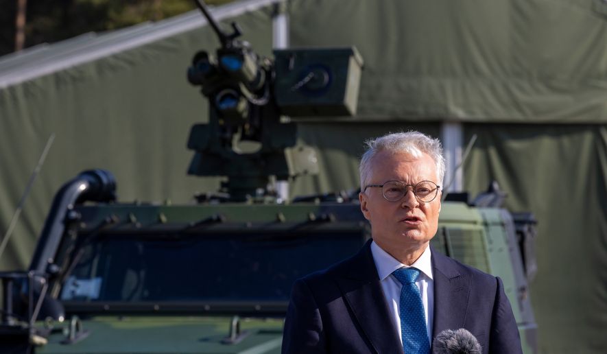 FILE - Lithuanian President Gitanas Nauseda speaks during a joint press conference with Czech Republic's President Petr Pavel during the visit to the Rukla military base some 100 kms (62.12 miles) west of the capital Vilnius, Lithuania, Friday, March 13, 2026. (AP Photo/Mindaugas Kulbis, File)