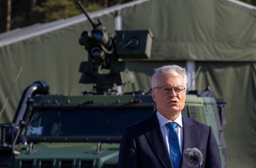 FILE - Lithuanian President Gitanas Nauseda speaks during a joint press conference with Czech Republic's President Petr Pavel during the visit to the Rukla military base some 100 kms (62.12 miles) west of the capital Vilnius, Lithuania, Friday, March 13, 2026. (AP Photo/Mindaugas Kulbis, File)