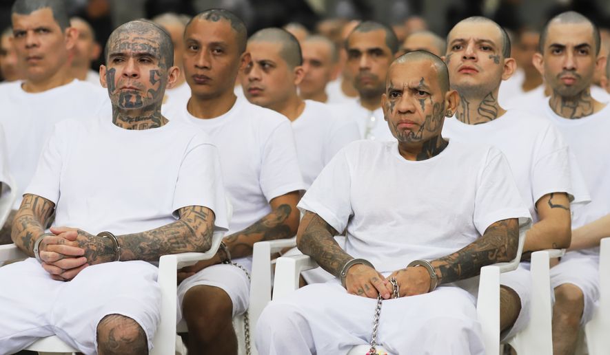 FILE - Alleged gang members take part in a mass trial at the Terrorism Confinement Center (CECOT) in Tecoluca, El Salvador, April 23, 2026. (AP Photo/Salvador Melendez, File)