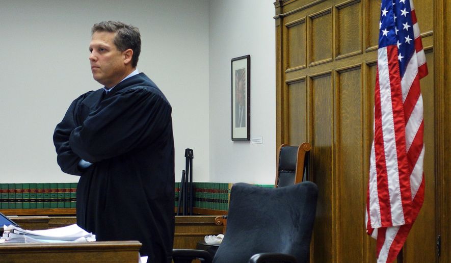 King County Superior Court Judge Roger Rogoff stands in court in Seattle on Oct. 10, 2016. (AP Photo/Ted S. Warren) **FILE**