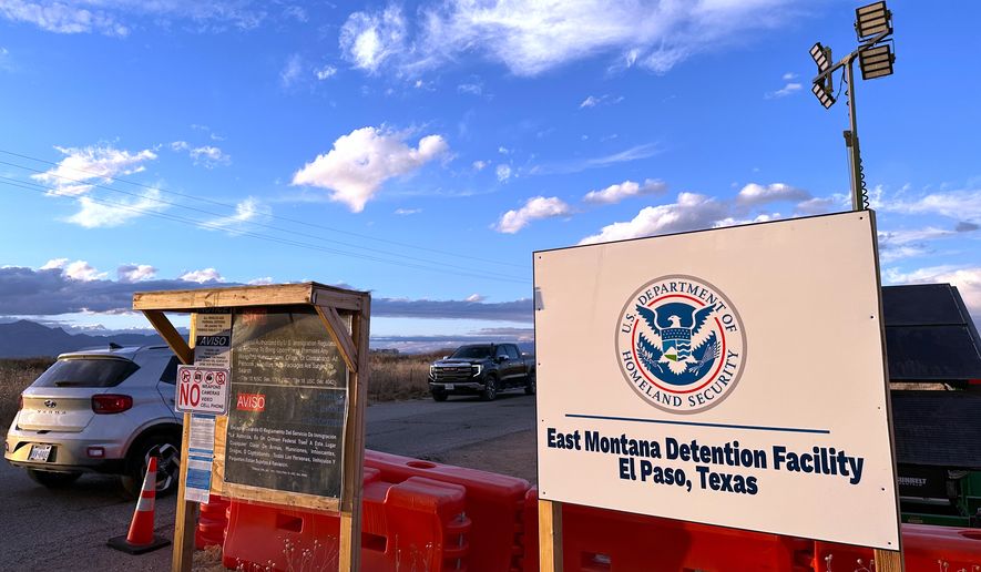 FILE - A sign marks the entrance to a series of hardened tents at the Camp East Montana immigrant detention center in the desert at a U.S. Army base on the outskirts of El Paso, Texas, Feb. 13, 2026. (AP Photo/Morgan Lee, File)
