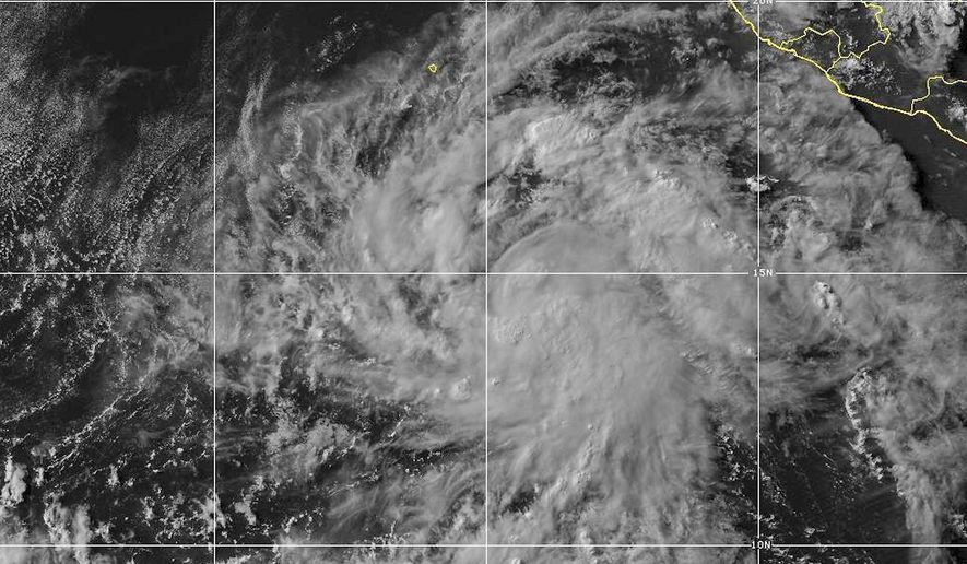This satellite image from the National Oceanic and Atmospheric Administration shows Tropical Storm Elida on Wednesday, July 15, 2026. (NOAA via AP)