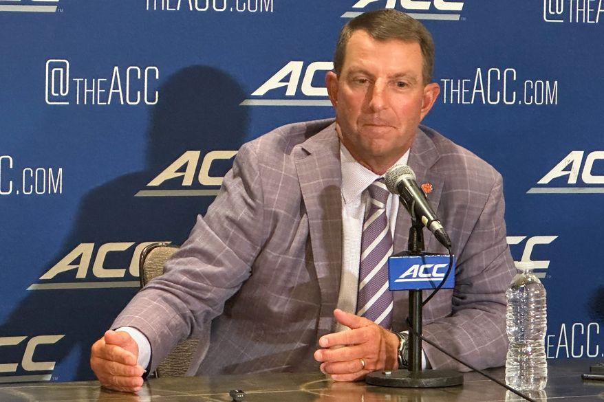Clemson coach Dabo Swinney speaks at a news conference during the ACC Kickoff preseason football media days Thursday, July 16, 2026, in Charlotte, N.C. (AP Photo/Aaron Beard)