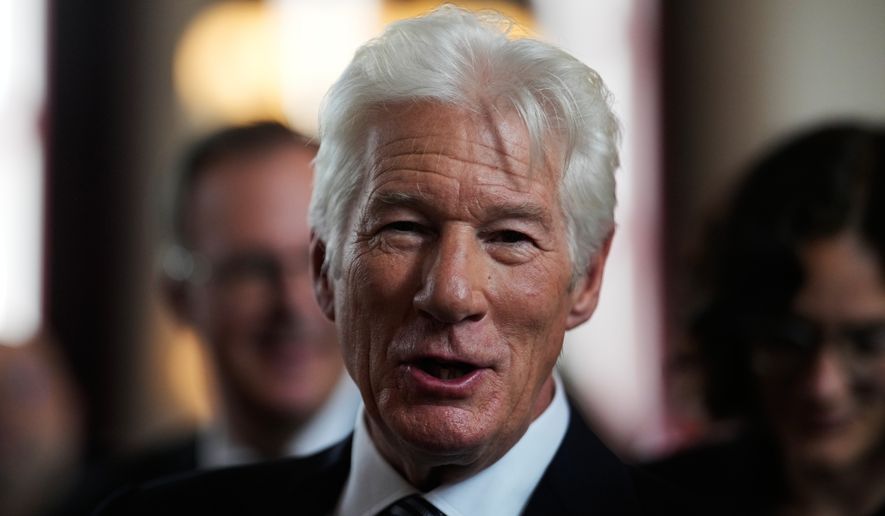 Richard Gere attends the launch event of a joint initiative on migration by Hertie School Centre for Fundamental Rights and The Gere Foundation in Berlin, Germany, Thursday, June 4, 2026. (AP Photo/Markus Schreiber)