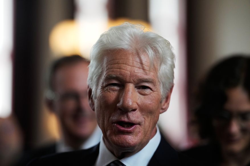 Richard Gere attends the launch event of a joint initiative on migration by Hertie School Centre for Fundamental Rights and The Gere Foundation in Berlin, Germany, Thursday, June 4, 2026. (AP Photo/Markus Schreiber)