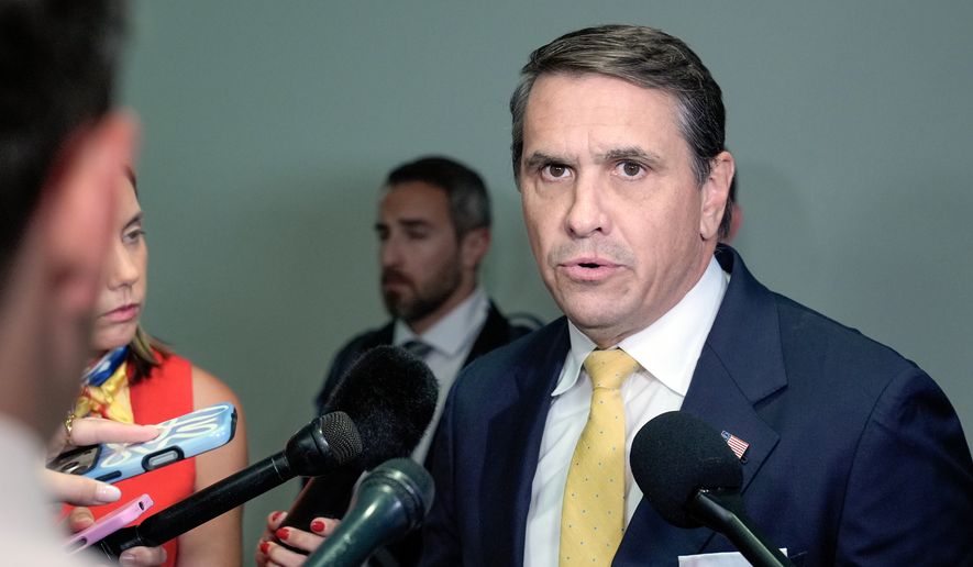 Acting Attorney General Todd Blanche talks with reporters after attending a meeting related to survivors of convicted sex offender Jeffrey Epstein, in Washington, Thursday, July 16, 2026. (AP Photo/Mariam Zuhaib)