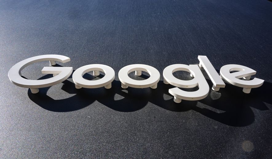 FILE - The Google logo is seen on a building in New York, Oct. 27, 2025. (AP Photo/Gene J. Puskar, File)