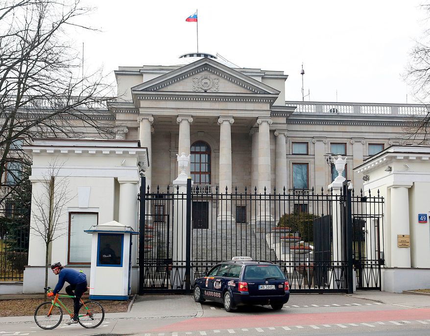 FILE - A taxi in front of the Russian Embassy in Warsaw, Poland, Monday, March 26, 2018. (AP Photo/Czarek Sokolowski, File)