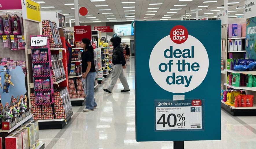 A sale information sign is displayed at a retail store in Wheeling, Ill., Thursday, June 25, 2026. (AP Photo/Nam Y. Huh)