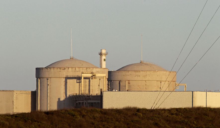 FILE - South Africa's Koeberg nuclear power station on the outskirts of the city of Cape Town, South Africa, Wednesday, Feb. 8, 2012. (AP Photo/Schalk van Zuydam, File)