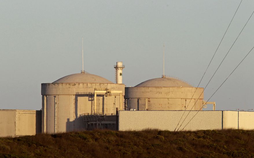 FILE - South Africa's Koeberg nuclear power station on the outskirts of the city of Cape Town, South Africa, Wednesday, Feb. 8, 2012. (AP Photo/Schalk van Zuydam, File)