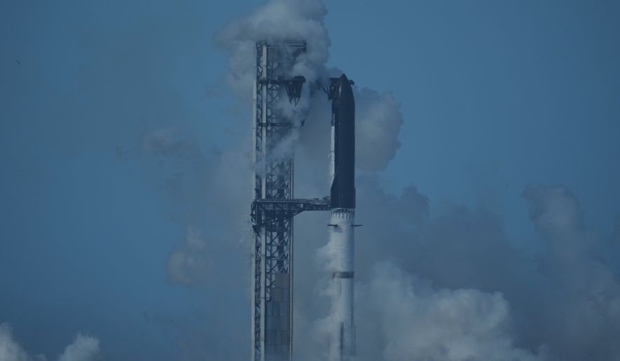 SpaceX's mega rocket Starship stands ready but was aborted before liftoff, in Starbase, Texas, Thursday, July 16, 2026. (AP Photo/Eric Gay)