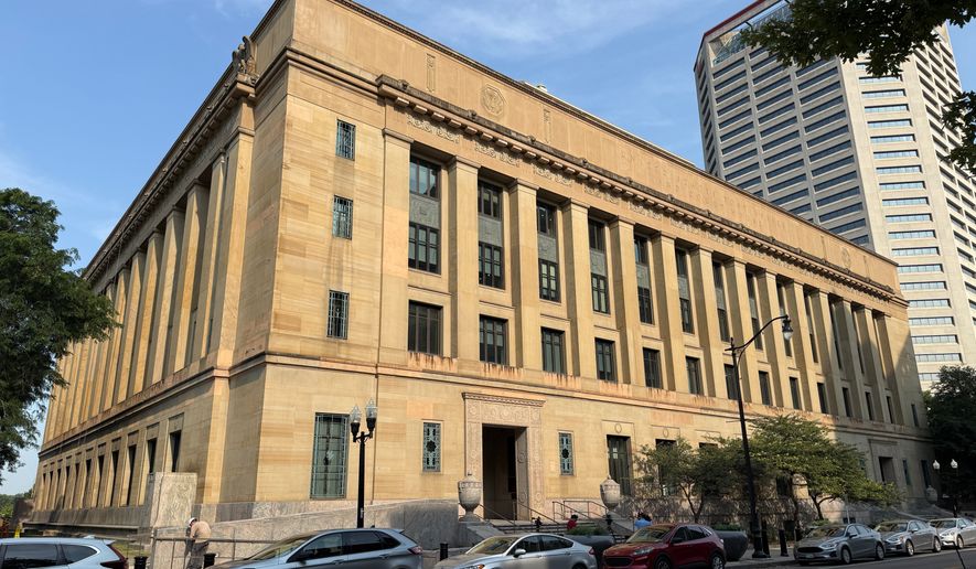Cars sit parked in front of the United States District Court for the Southern District of Ohio Thursday, July 16, 2026, in Columbus, Ohio. (AP Photo/Patrick Aftoora-Orsagos)