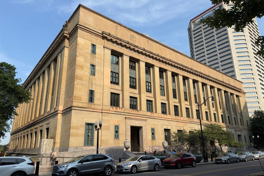 Cars sit parked in front of the United States District Court for the Southern District of Ohio Thursday, July 16, 2026, in Columbus, Ohio. (AP Photo/Patrick Aftoora-Orsagos)