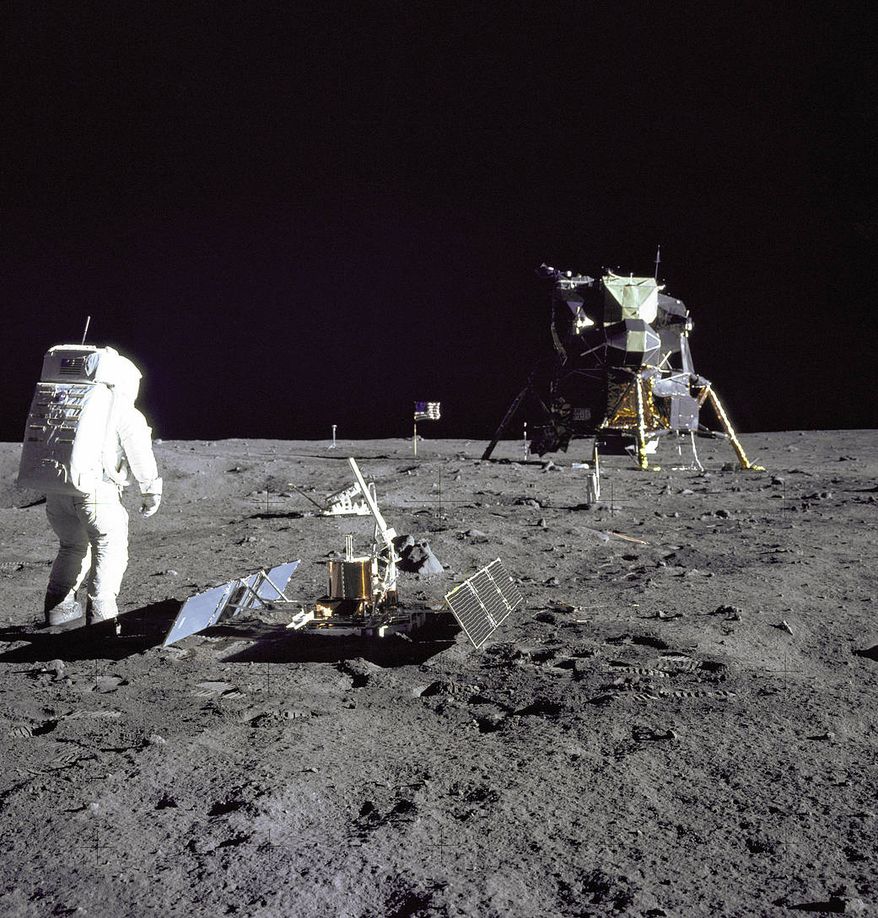 FILE- In this image released by NASA, Astronaut Edwin E. Aldrin Jr., a lunar module pilot, stands on the lunar surface after the Apollo 11 moon landing on July 20, 1969. The Lunar Module is seen in the background. (NASA via AP, File)