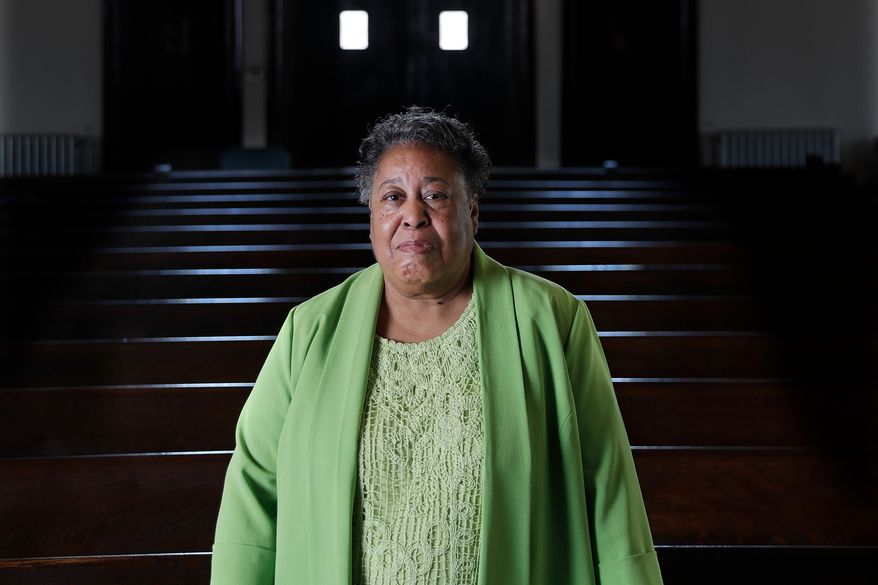 FILE - Clara Ester stands in the Centenary United Methodist Church in Memphis, Tenn., on March 17, 2018. (AP Photo/Mark Humphrey, File)