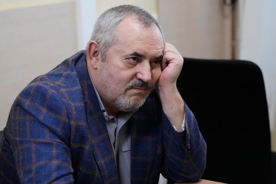 Russian politician Boris Nadezhdin, accused of displaying "extremist symbols," attends a court session in the town of Dolgoprudny outside Moscow, Russia, Friday, July 17, 2026. (AP Photo/Pavel Bednyakov)