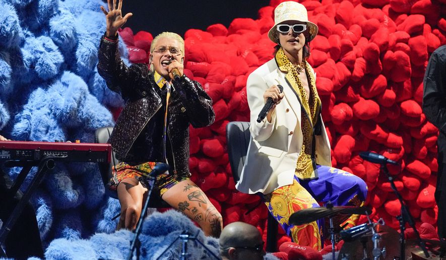 FILE - Paco Amoroso, left, and Ca7riel perform during the 2025 Latin Grammys in Las Vegas on Nov. 13, 2025. (AP Photo/Chris Pizzello, File)