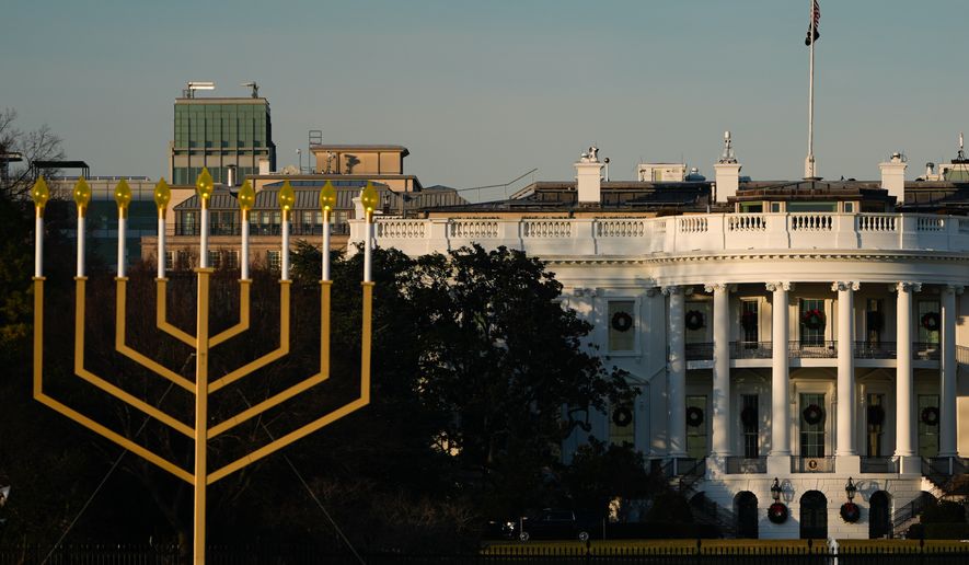 FILE - A large menorah stands in front of the White House on the third night of Hanukkah, Dec. 16, 2025, in Washington. (AP Photo/Julia Demaree Nikhinson, File)