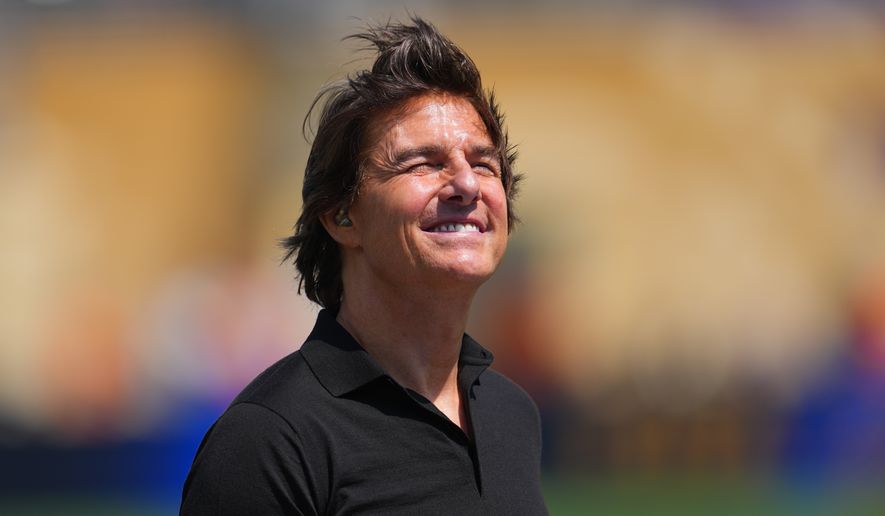 Tom Cruise speaks during the World Cup final soccer match between Spain and Argentina in East Rutherford, N.J., near New York, Sunday, July 19, 2026. (AP Photo/Julio Cortez)