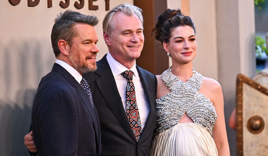 Matt Damon, from left, director Christopher Nolan, and Anne Hathaway attend the premiere of "The Odyssey" at AMC Lincoln Square on Tuesday, July 14, 2026, in New York. (Photo by Evan Agostini/Invision/AP)