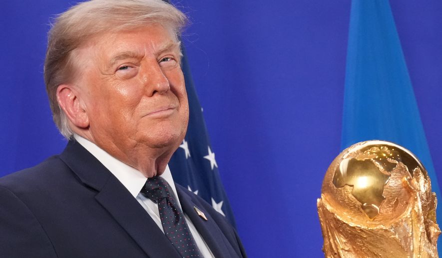 President Donald Trump listens as FIFA President Gianni Infantino speaks at a reception at Trump Tower in New York, Friday, July 17, 2026. (AP Photo/Jacquelyn Martin)