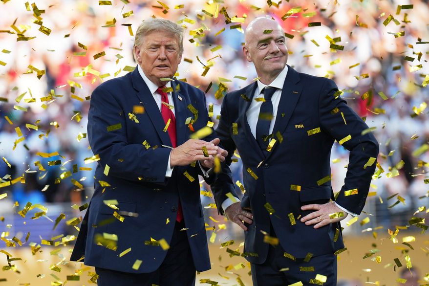President Donald Trump, left, and FIFA President Gianni Infantino watch confetti fall at the conclusion of the World Cup championship final soccer match between Spain and Argentina in East Rutherford, N.J., Sunday, July 19, 2026. (AP Photo/Jacquelyn Martin)