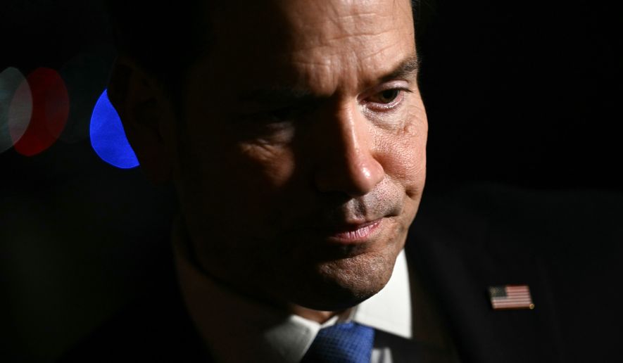 U.S. Secretary of State Marco Rubio speaks to reporters before departing from Joint Base Andrews, Md., Sunday, July 19, 2026, to the Philippines to attend the ASEAN foreign ministers' meeting and other related meetings. (Brendan Smialowski/Pool Photo via AP)