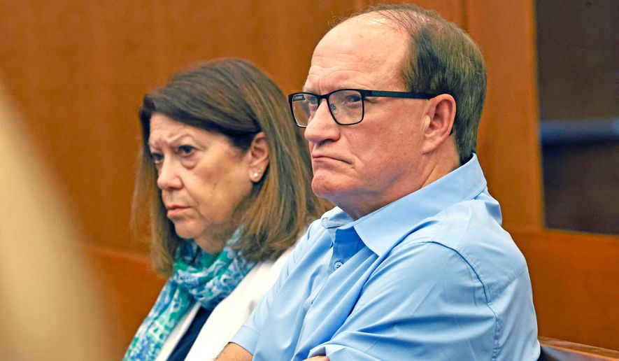 Paula and Mike Musgrove, parents of Lindsay Clancy, sit as jury selection starts in Lindsay's murder trial where she is charged in the 2023 killing of her three children, Monday, July 20, 2026, in Plymouth Superior Court in Plymouth, Mass. (Greg Derr/The Patriot Ledger via AP, Pool)