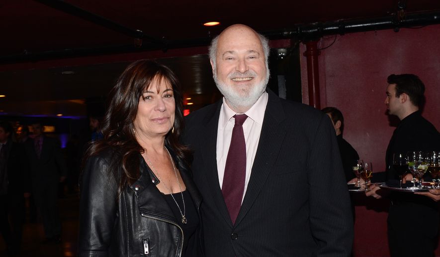 Actor Rob Reiner and his wife, Michele Singer, arrive for an event on Dec. 17, 2013, in New York. (Photo by Evan Agostini/Invision/AP, File)