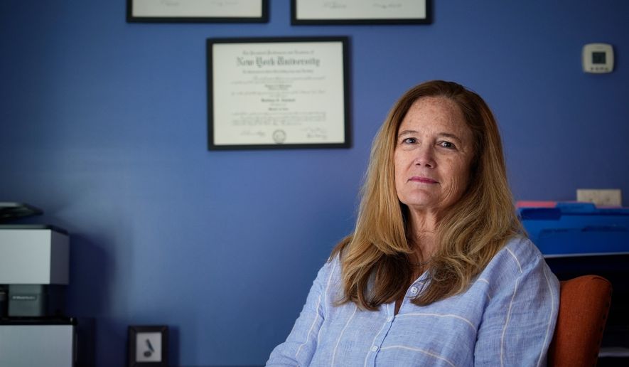 Barbara Howaniec, a psychiatric nurse practitioner, poses for a photo in her office on Monday, June 15, 2026, in Portland, Maine. (AP Photo/Robert F. Bukaty)