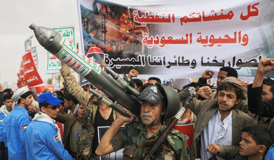 Houthi supporters hold a rally in Sanaa, Yemen, Friday, July 17, 2026, against the Saudi-led coalition. Banner in Arabic reads, "All Saudi oil facilities are targets to our missiles and drones." (AP Photo/Osamah Abdulrahman)