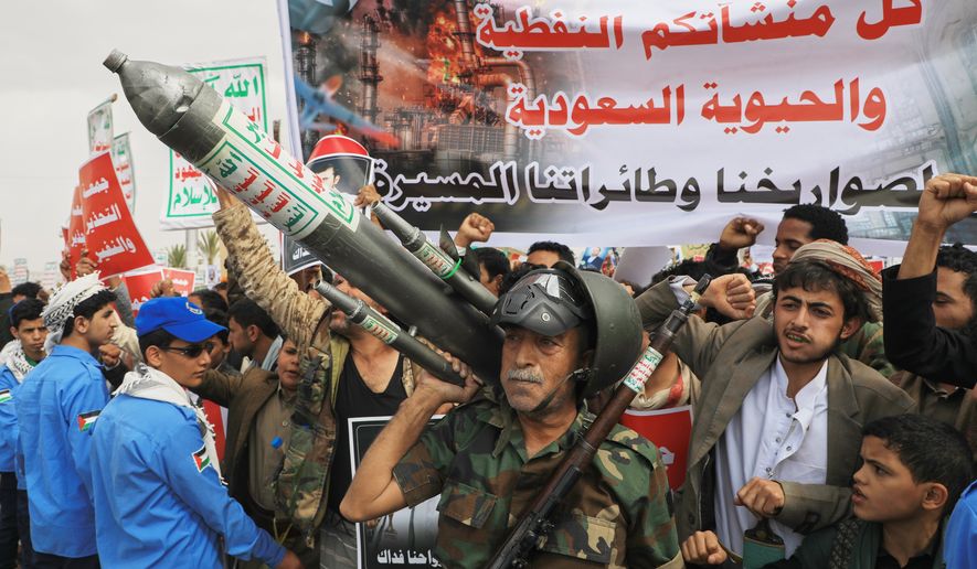 Houthi supporters hold a rally in Sanaa, Yemen, Friday, July 17, 2026, against the Saudi-led coalition. Banner in Arabic reads, "All Saudi oil facilities are targets to our missiles and drones." (AP Photo/Osamah Abdulrahman) ** FILE **