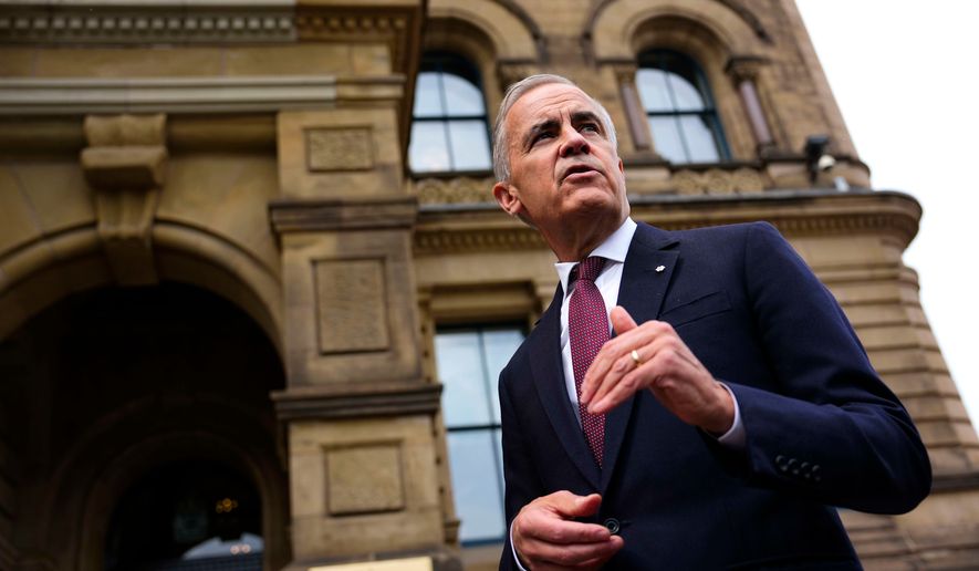 Canada Prime Minister Mark Carney makes a statement outside the Office of the Prime Minister and Privy Council in Ottawa, on Tuesday, July 21, 2026.(Justin Tang/The Canadian Press via AP)