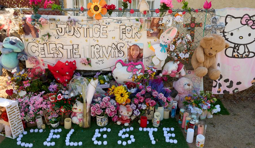 FILE - A makeshift Memorial for Celeste Rivas Hernandez, who was killed and found inside a vehicle owned by singer D4vd, is placed outside her home in Lake Elsinore, Calif., on April 21, 2026. (AP Photo/Damian Dovarganes, file)