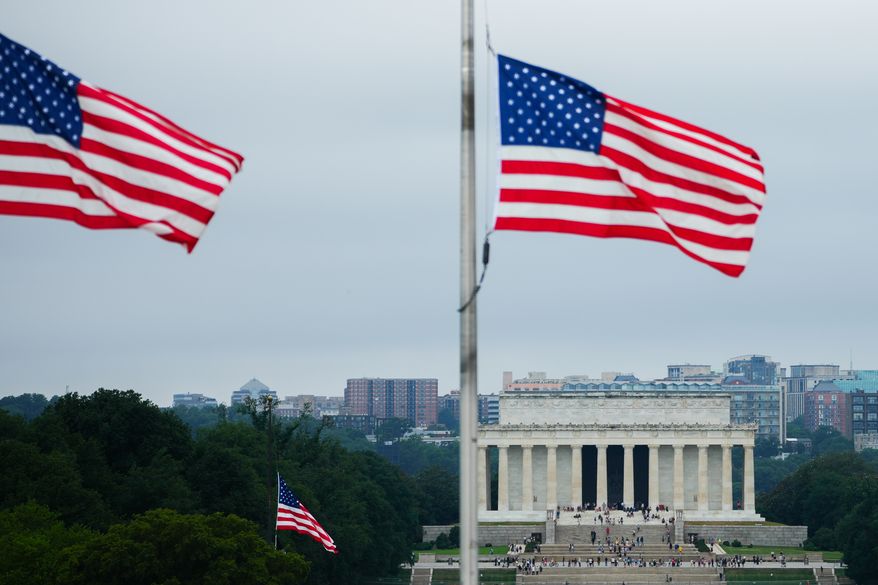 American flags fly above the Lincoln Memorial, Thursday, July 9, 2026, in Washington. (AP Photo/Julia Demaree Nikhinson)